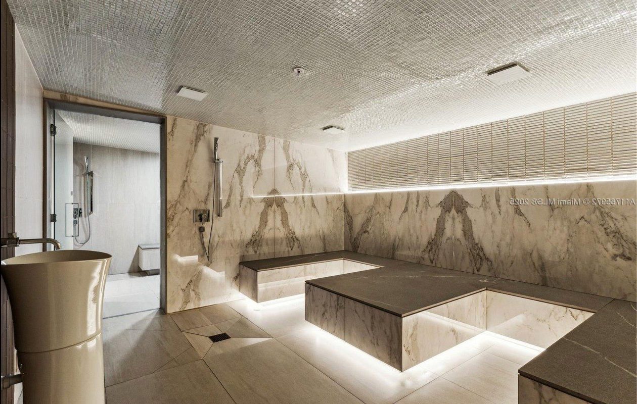 Marble hammam with backlit stone benches