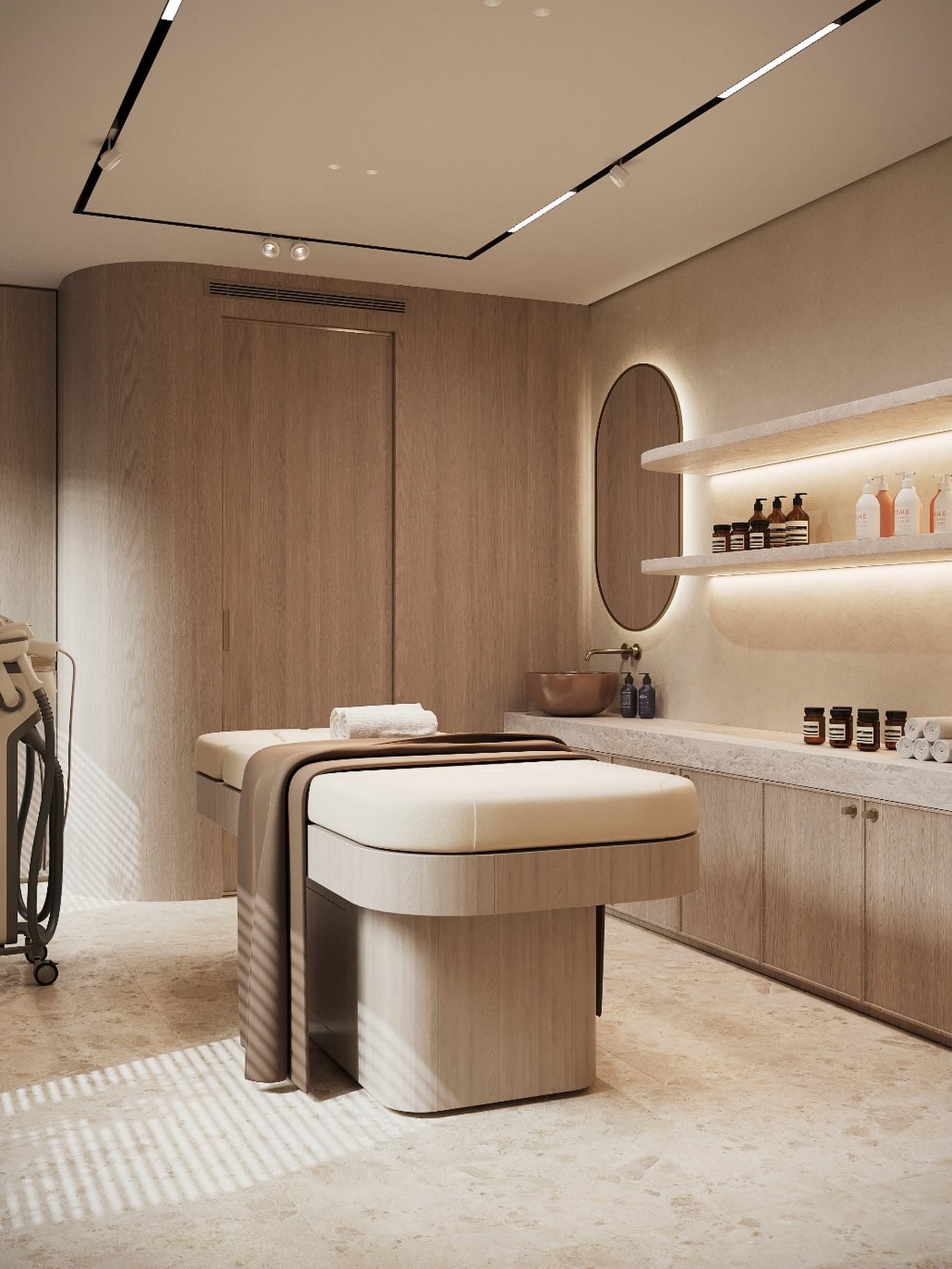 A treatment room with a padded table, curved timber walls and lit shelves.